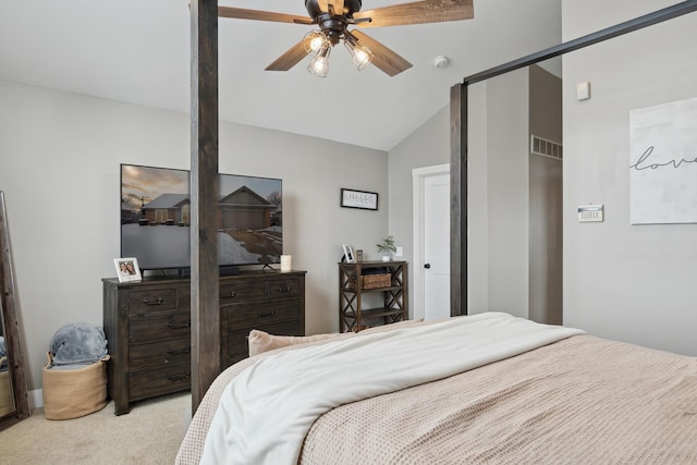 bedroom with lofted ceiling, a ceiling fan, visible vents, and light colored carpet