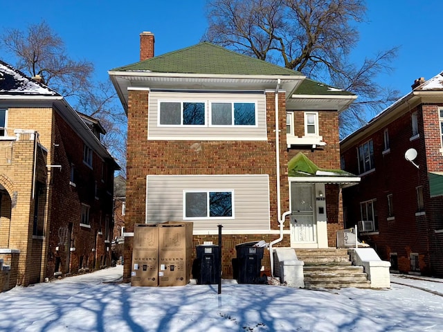 view of front of property featuring cooling unit