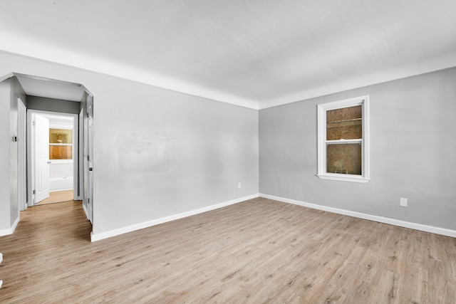 unfurnished room featuring light wood-type flooring