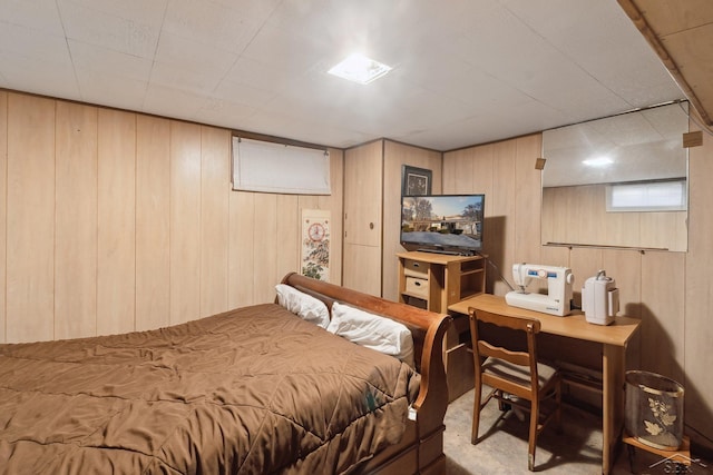 bedroom with wood walls