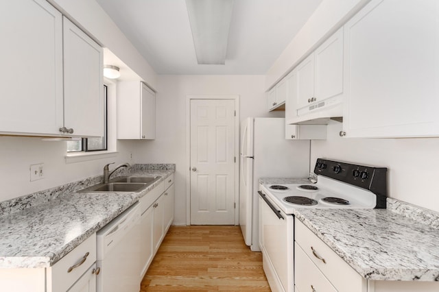 kitchen with sink, light hardwood / wood-style flooring, white appliances, light stone countertops, and white cabinets