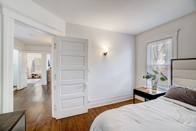 bedroom featuring dark hardwood / wood-style floors