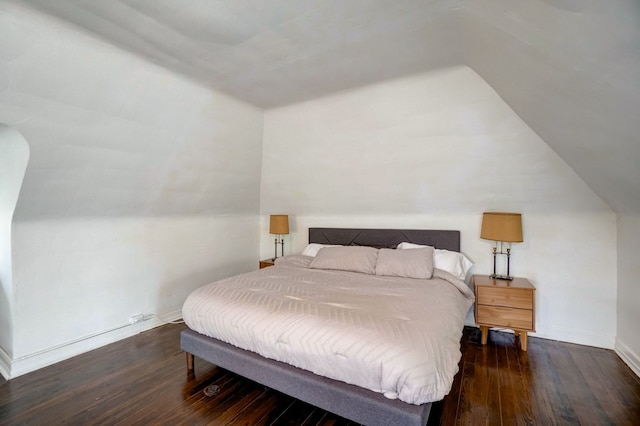 bedroom featuring dark hardwood / wood-style flooring