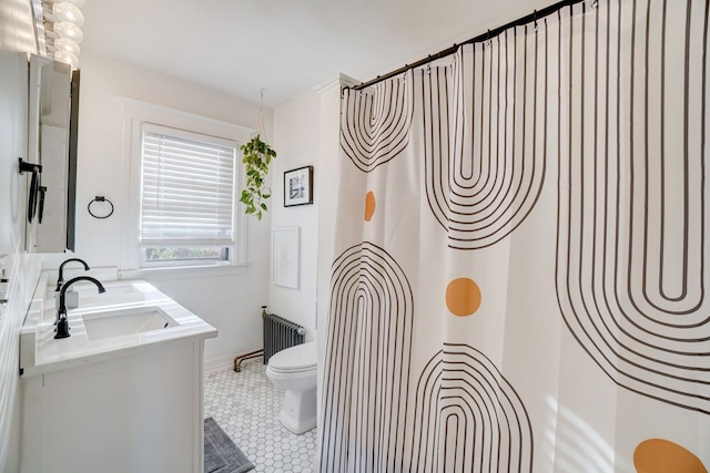 bathroom with toilet, radiator heating unit, vanity, a shower with shower curtain, and tile patterned flooring