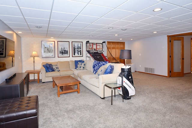 living area with baseboards, visible vents, a drop ceiling, carpet floors, and recessed lighting