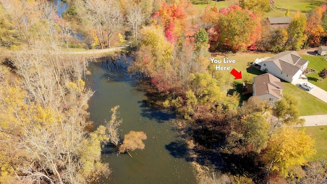 birds eye view of property featuring a water view