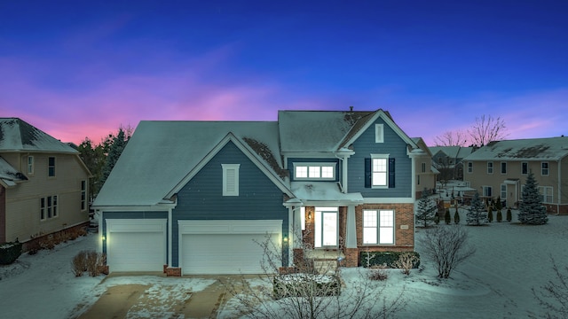 view of front of property with a garage