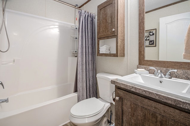 full bathroom with shower / bath combination with curtain, vanity, and toilet