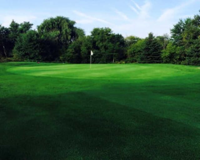 view of home's community featuring golf course view