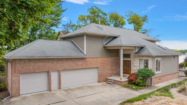 view of front of property with a garage