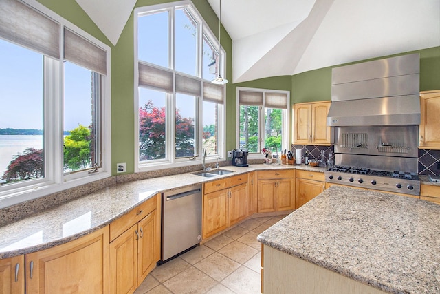 kitchen featuring lofted ceiling, sink, dishwasher, extractor fan, and light stone countertops