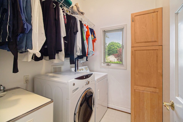 washroom featuring separate washer and dryer