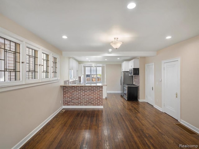 interior space featuring dark hardwood / wood-style flooring