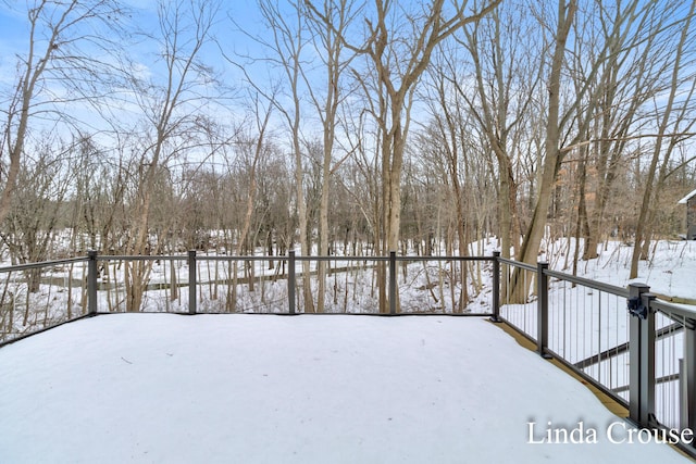 view of yard layered in snow