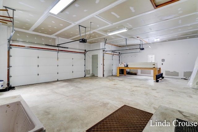 garage featuring a garage door opener