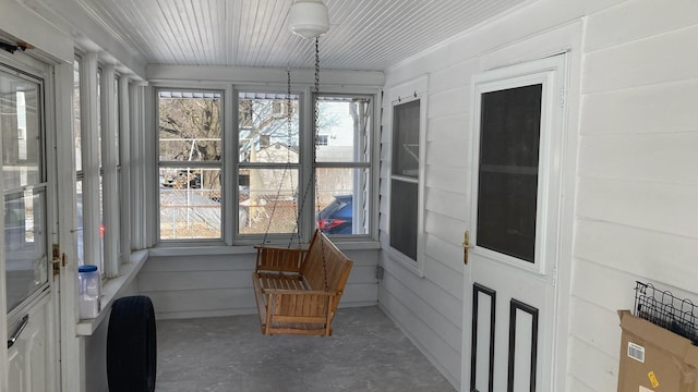 unfurnished sunroom with a healthy amount of sunlight