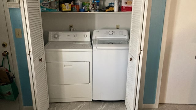 washroom featuring separate washer and dryer