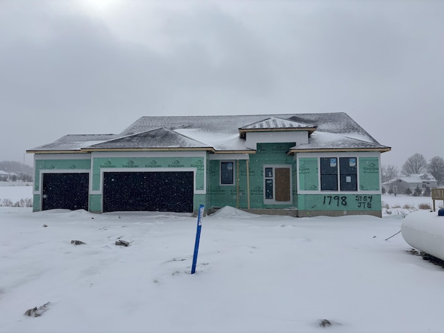 property under construction featuring a garage