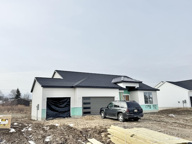 view of front of home featuring an attached garage