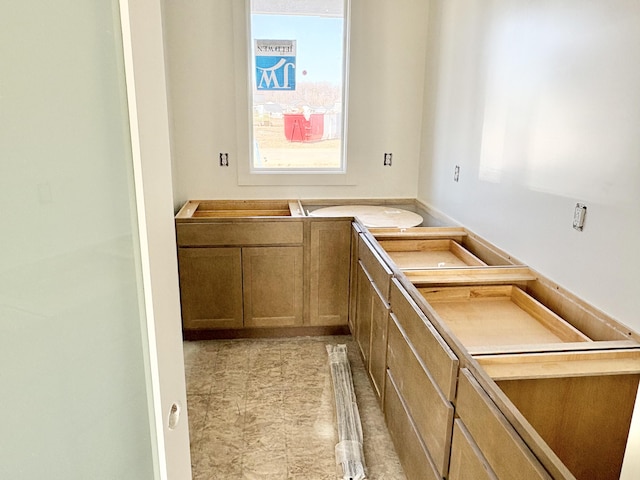 kitchen with brown cabinetry