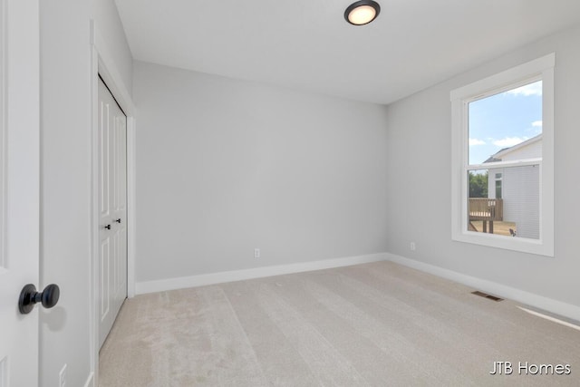 1798 Round Barn Dr, Hudsonville, MI 49426 - unfurnished bedroom featuring carpet floors and a closet
