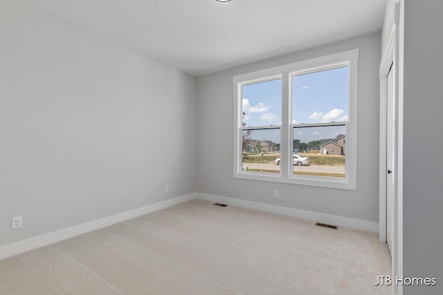 1798 Round Barn Dr, Hudsonville, MI 49426 - spare room with light carpet and baseboards