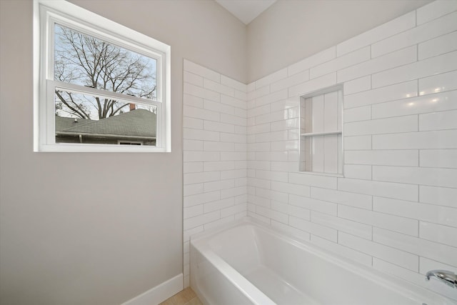675 Crescent Lake Rd, Waterford, MI 48327 - bathroom featuring baseboards and shower / bathing tub combination