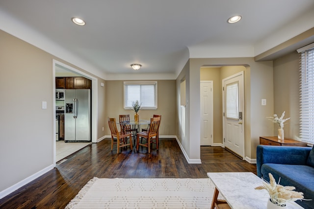 dining area featuring dark hardwood / wood-style flooring