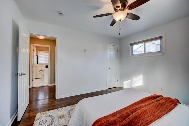 bedroom featuring dark hardwood / wood-style flooring, a closet, and ceiling fan