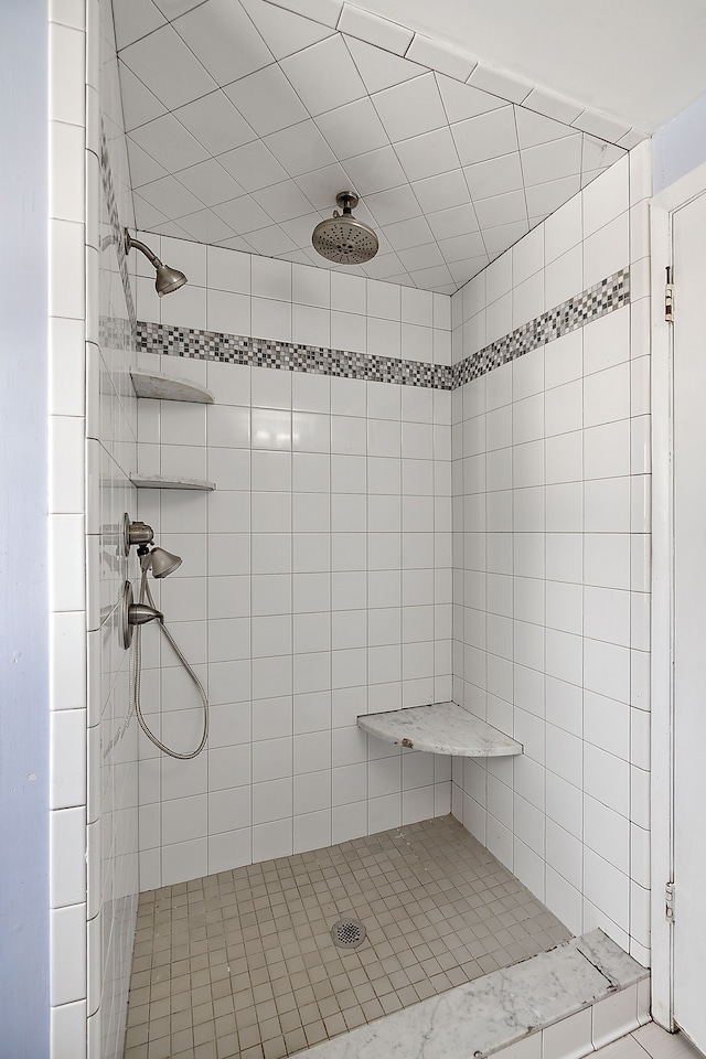 full bathroom with a stall shower