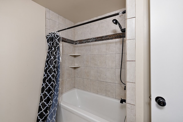 bathroom with shower / bathtub combination with curtain