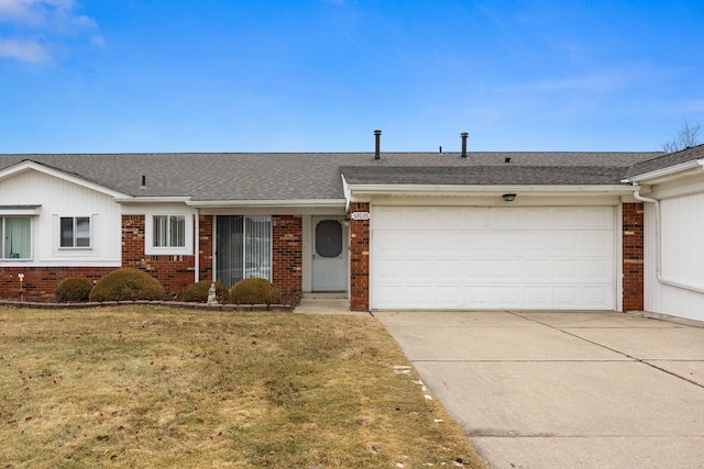 ranch-style house with a garage and a front yard