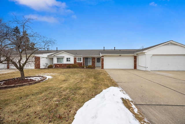 ranch-style home with a garage and a front lawn