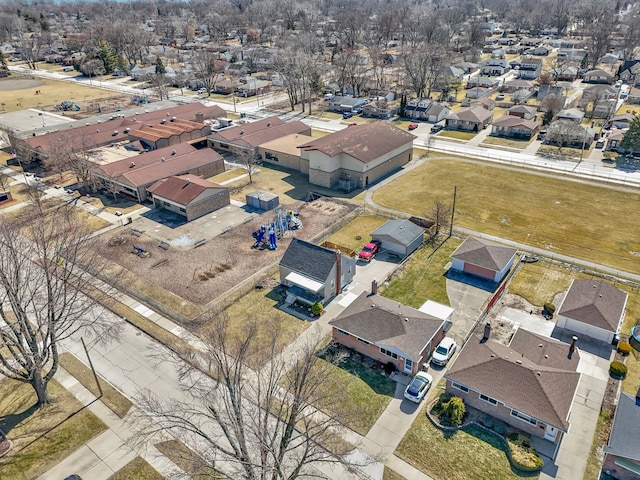 birds eye view of property with a residential view