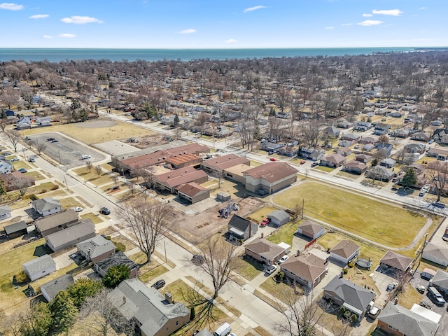 aerial view with a residential view and a water view