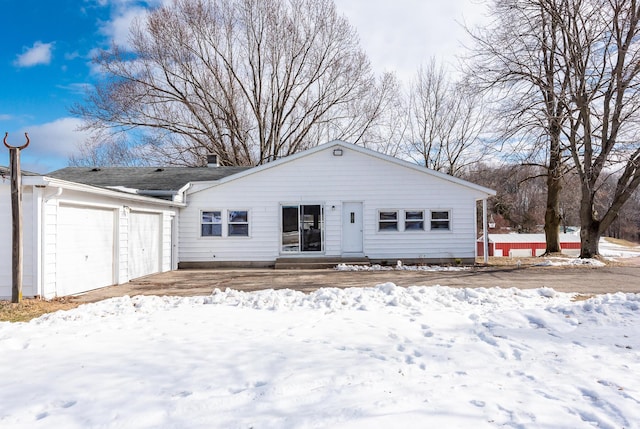 single story home featuring a garage