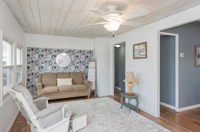 living room featuring wood ceiling, ceiling fan, and hardwood / wood-style floors