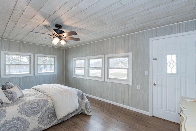 bedroom with multiple windows, hardwood / wood-style flooring, wooden ceiling, and ceiling fan