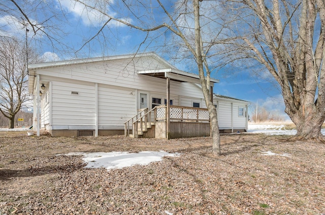 view of snow covered house