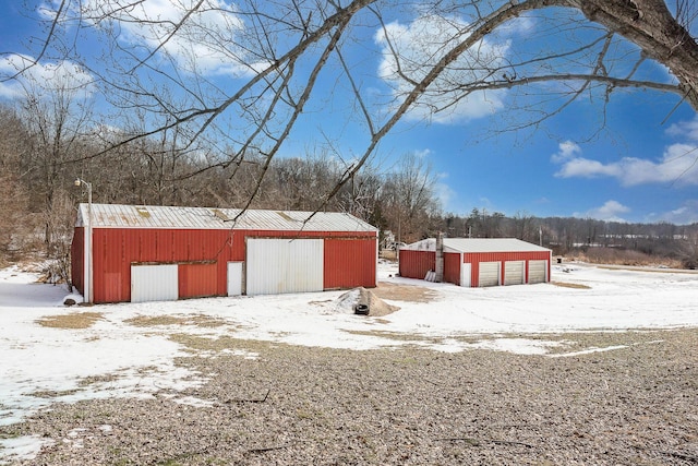 view of snow covered garage