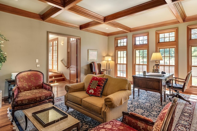 living room featuring beamed ceiling, wood finished floors, stairs, and coffered ceiling