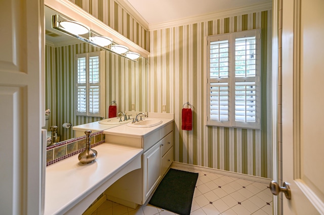 bathroom with wallpapered walls, crown molding, and baseboards