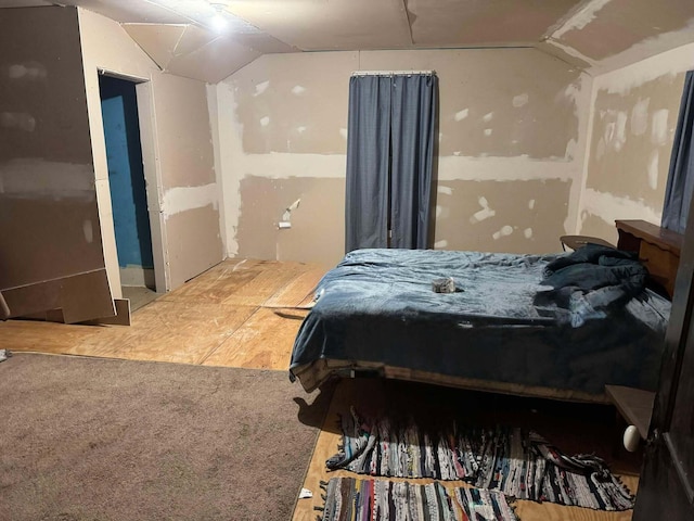 bedroom featuring vaulted ceiling