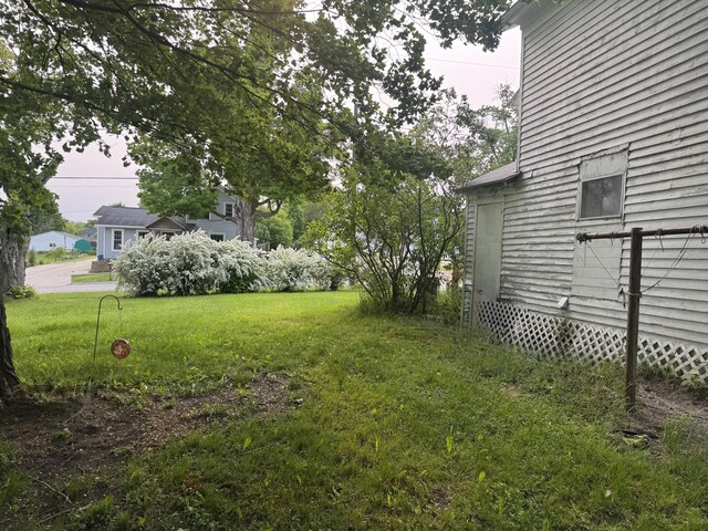 313 W 6th St, Evart, MI 49631 - view of grassy yard