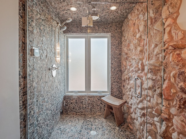 bathroom featuring an enclosed shower