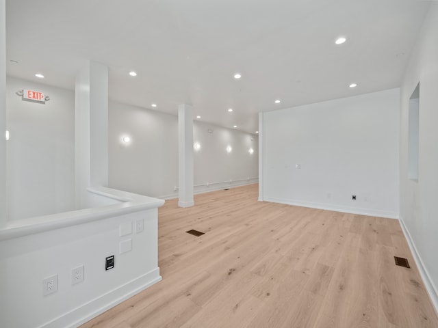 spare room featuring light hardwood / wood-style floors