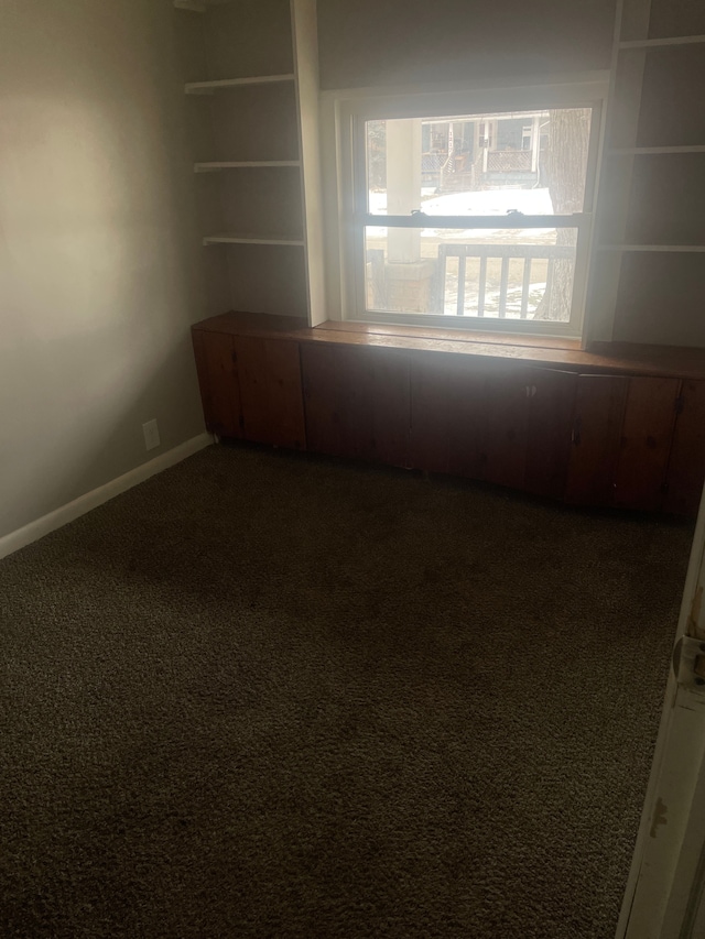 spare room featuring carpet