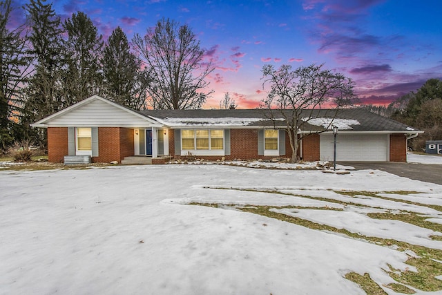 single story home with a garage