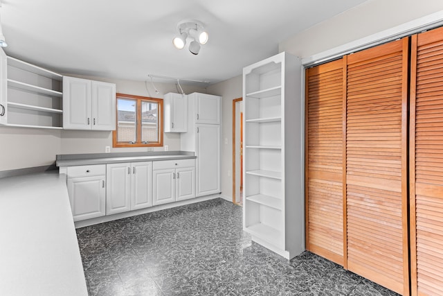 kitchen with white cabinetry