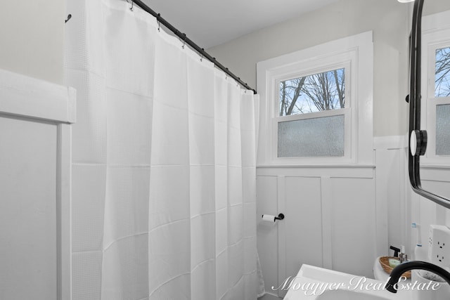 bathroom with sink and a wealth of natural light